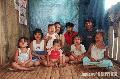 "Lumad Family in their House"